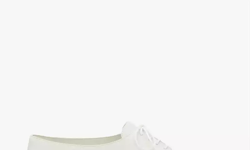 Lily Collins Embraces French-Girl Style with Classic Jazz Shoes